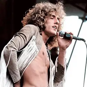 Frontman Roger Daltrey singing on stage