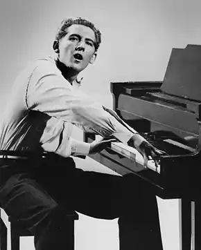 Jerry Lee Lewis singing at piano